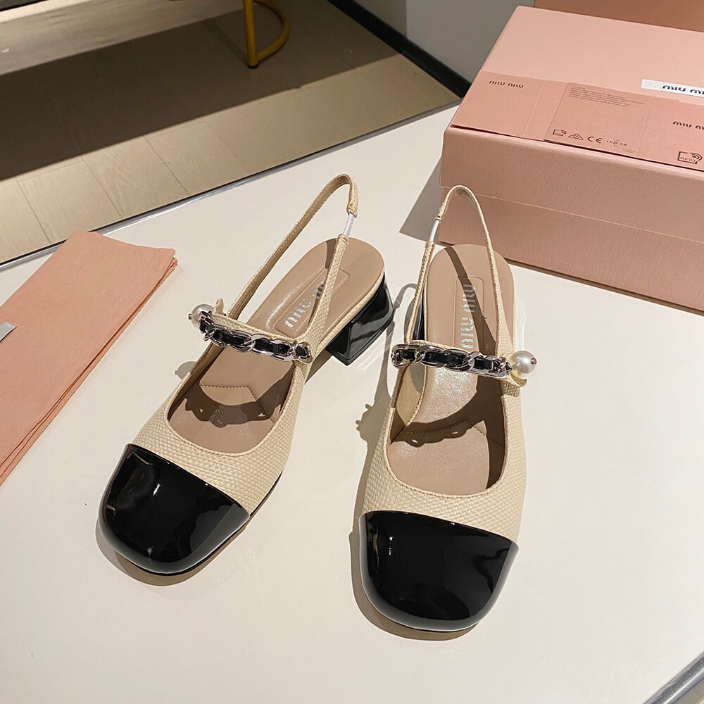 MIUMIU Patent leather and raffia slingback pumps