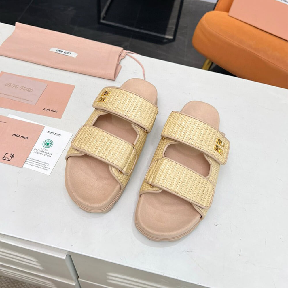 MiuMiu Raffia-effect woven fabric slides