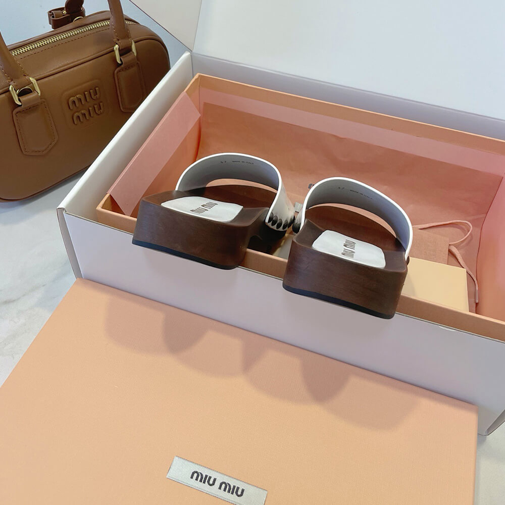 MiuMiu Patent leather clogs