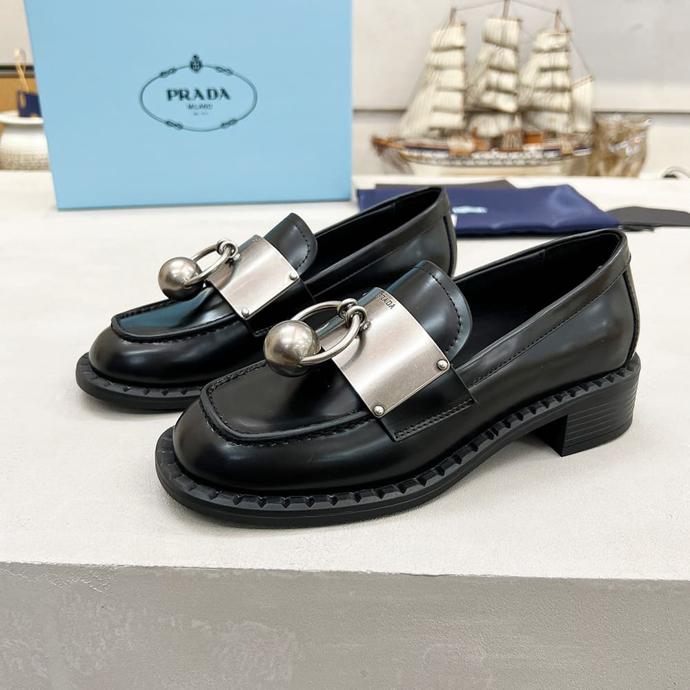 PRADA Brushed leather loafers with metal details
